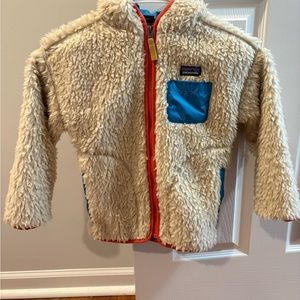 Patagonia Cream Jacket with Blue and Red Accents